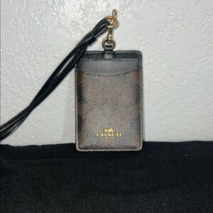 Coach Black and Brown Card Holder with Wrist Strap